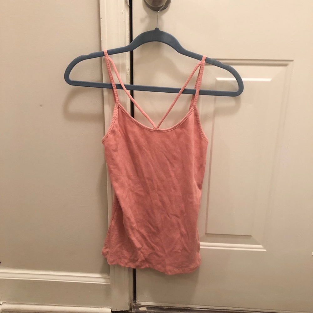 Medium light pink tank. Brand new, never worn.